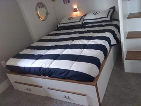 Architectural Quad Bunk Design with Integrated Stairs - Precision-Built Guest Retreat